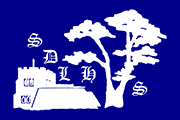 The initials 'SDLHS' with image of church and cedar tree
